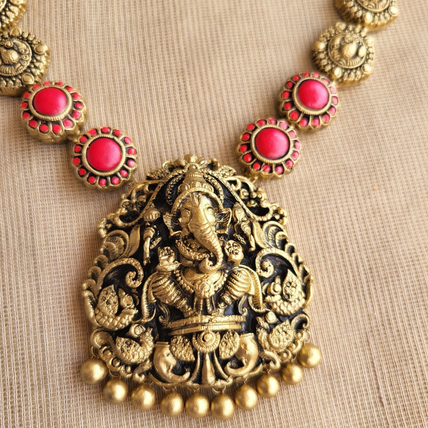 Peacock motif with red floral detailing