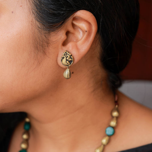 Mavinai - Rain drop lined antique gold bead and dark green disk bead with Radha Krishna pendant with pink highlights terracotta jewellery with matching peacock stud