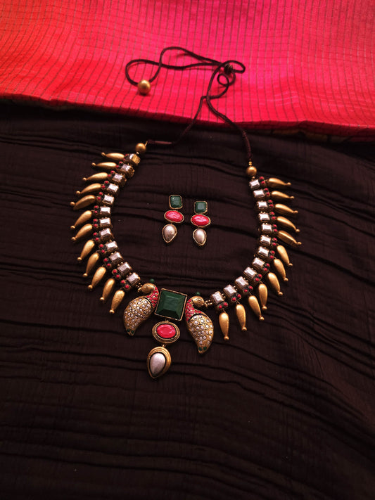 Mayura Kundan Antique Gold Peacock Fringe & Multi-Color Geometric Terracotta Set