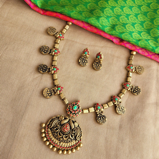 Moksha - Red and aqua blue floral and coin motifs with tubes and antique gold peacock pendant terracotta jewellery