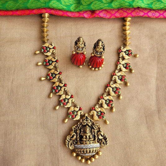 Naruvi - Red, Green, white peacock motif necklace with antique gold Lakshmi pendant terracotta jewellery with matching jumkas