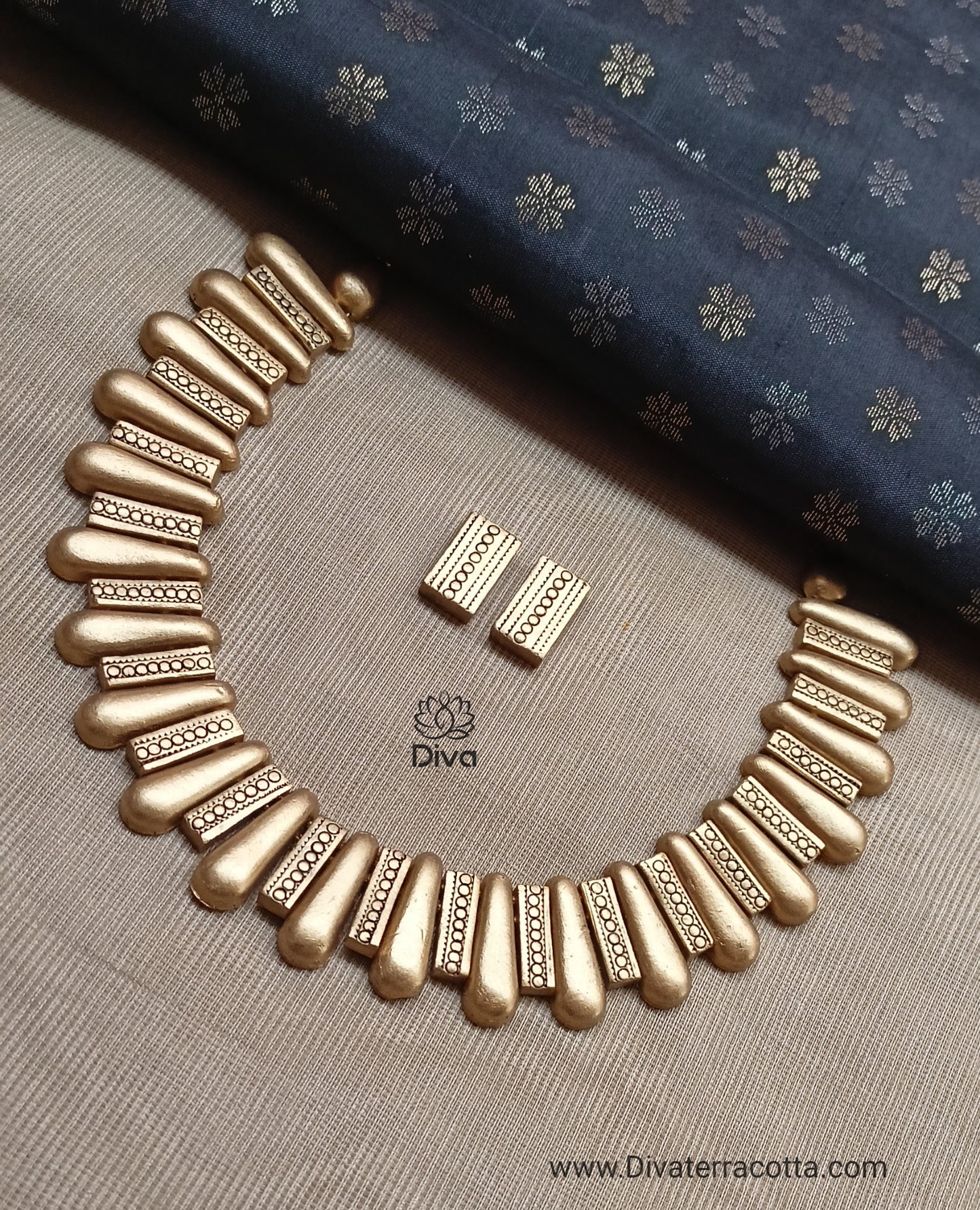 Antique gold paisley terracotta jewellery