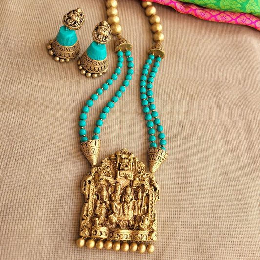 Ponni - Blue double row bead necklace with Siva Parvathy Ganesh Muruga idol pendant in antique gold terracotta jewellery with matching jumkas