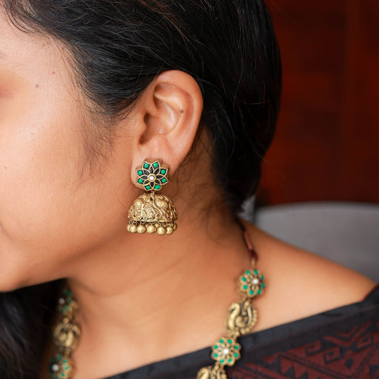 Pravisha - green, white Star flower and peacock motif necklace with anique gold lakshmi pendant terracotta jewellery with matching jumkas