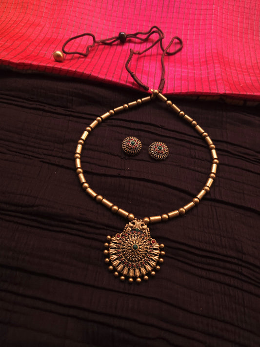 Tanvi Antique Gold Tubular Bead & Concentric Chakra Terracotta Pendant Set