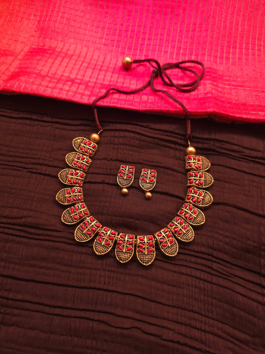 The Shani Archana Antique Gold Mesh & Crimson Leaf Terracotta Set