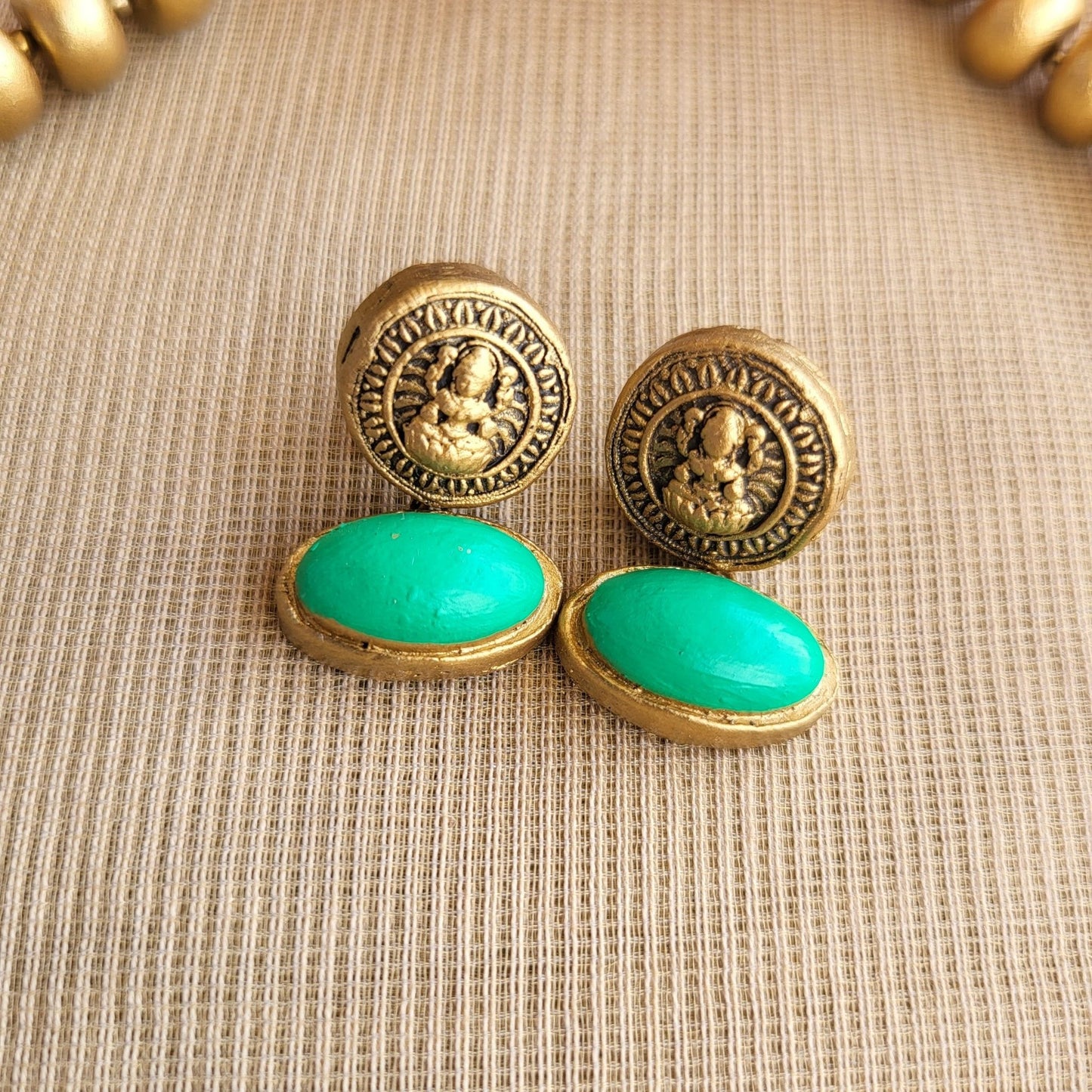 Matching terracotta earrings with Lakshmi motif1