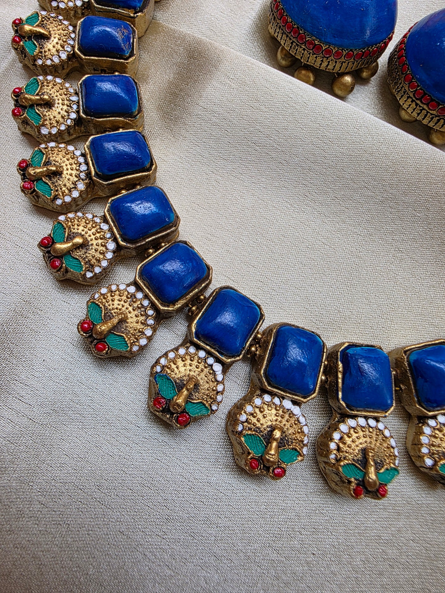 Terracotta Blue Hue Peacock Necklace with Jhumka