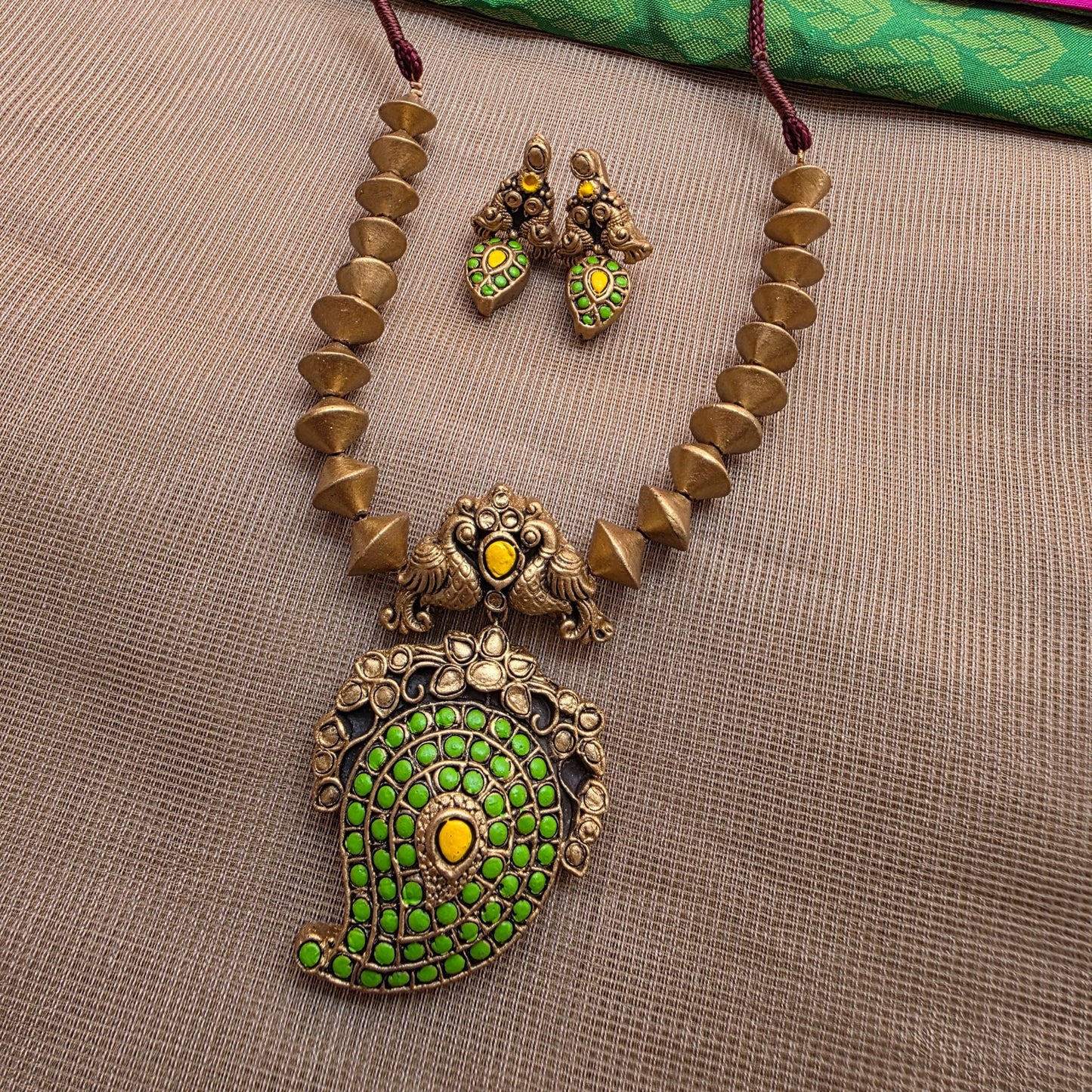 Kemp Mango Double peacock pendant with antique Gold Bicone Terracotta Jewellery