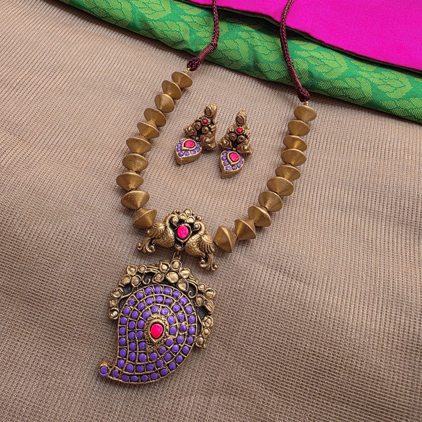 Kemp Mango Double peacock pendant with antique Gold Bicone Terracotta Jewellery