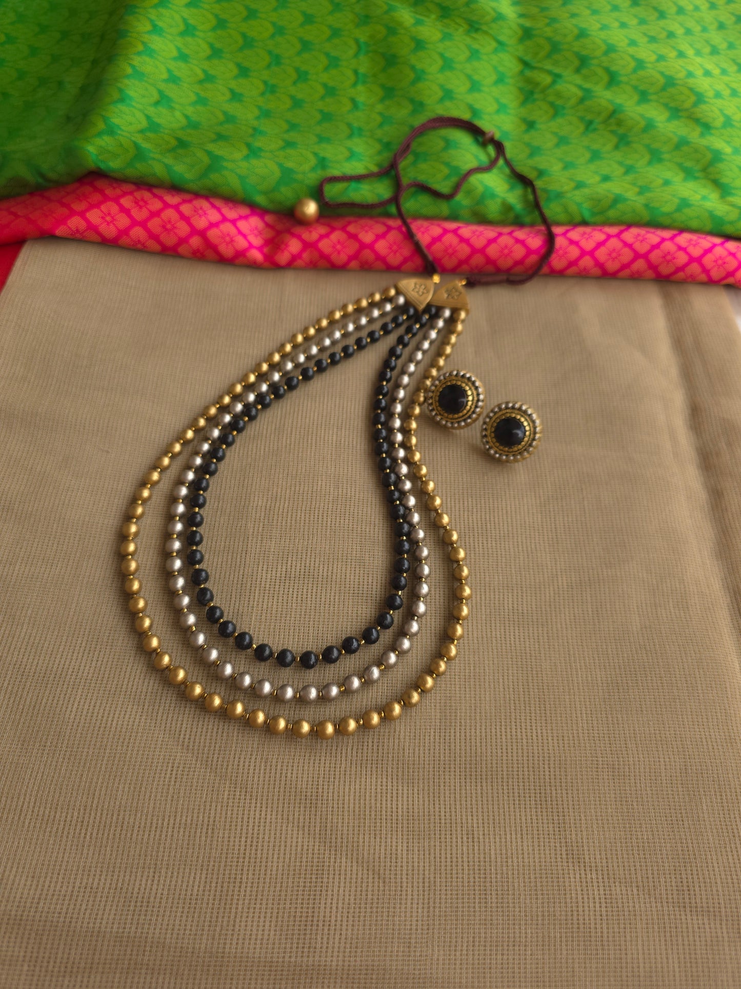 3 layered- Black, gold,silver bead terracotta necklace