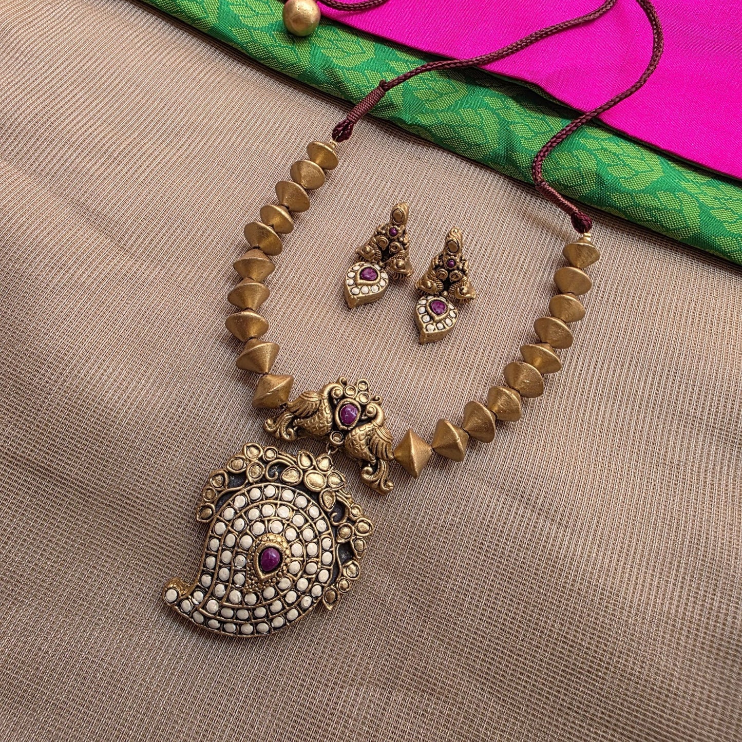 Kemp Mango Double peacock pendant with antique Gold Bicone Terracotta Jewellery