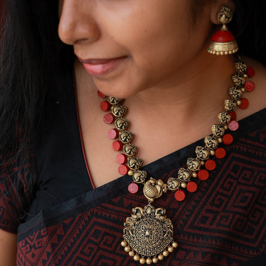 Hand-sculpted terracotta jewellery with traditional Indian motifs