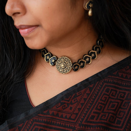 Ektara black and gold terracotta choker mandala pendant