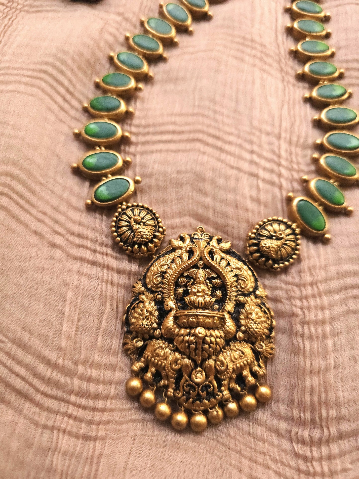 Gaja Lakshmi Antique Gold Peacock Frame & Emerald Green Terracotta Temple Set