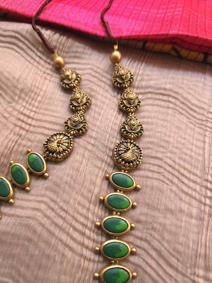Gaja Lakshmi Antique Gold Peacock Frame & Emerald Green Terracotta Temple Set