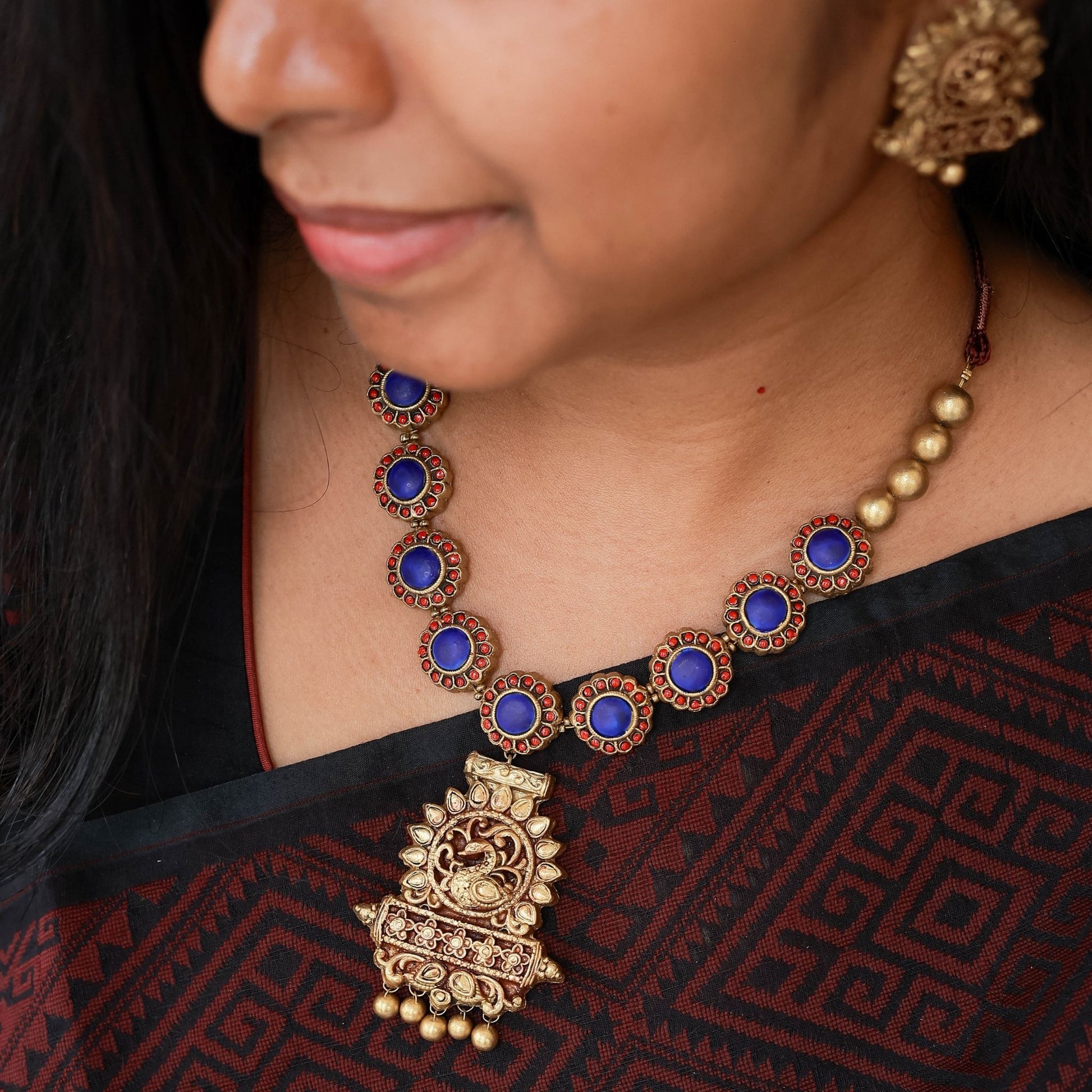 Geetham terracotta necklace red blue floral design peacock pendant