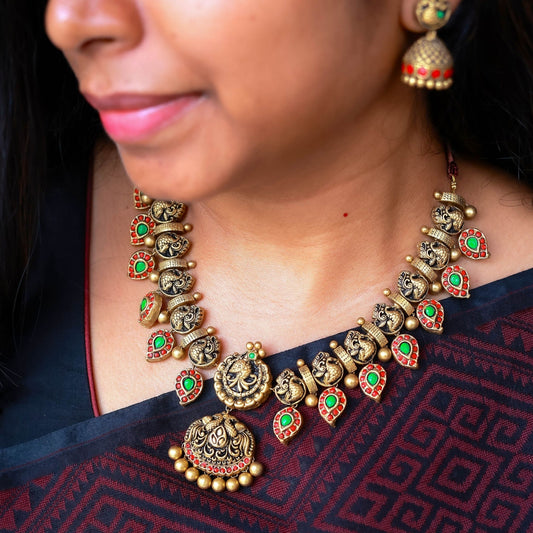 Ilaya terracotta peacock jewellery antique gold red green design