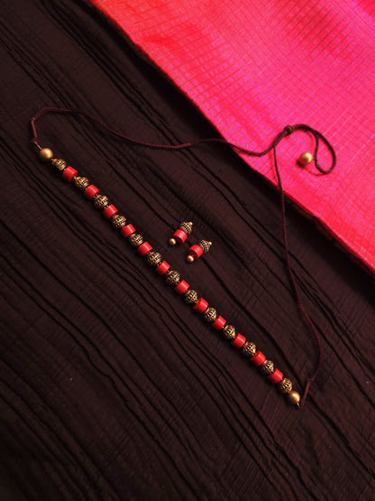 Kalyani Antique Gold Ribbed & Crimson Cylinder Terracotta Choker Set