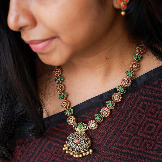 Karigai terracotta Lakshmi coin pendant orange green geometric design