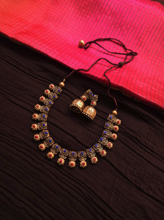 Kausalya Antique Gold Jharokha & Cobalt-Crimson Terracotta Collar Set with jumka