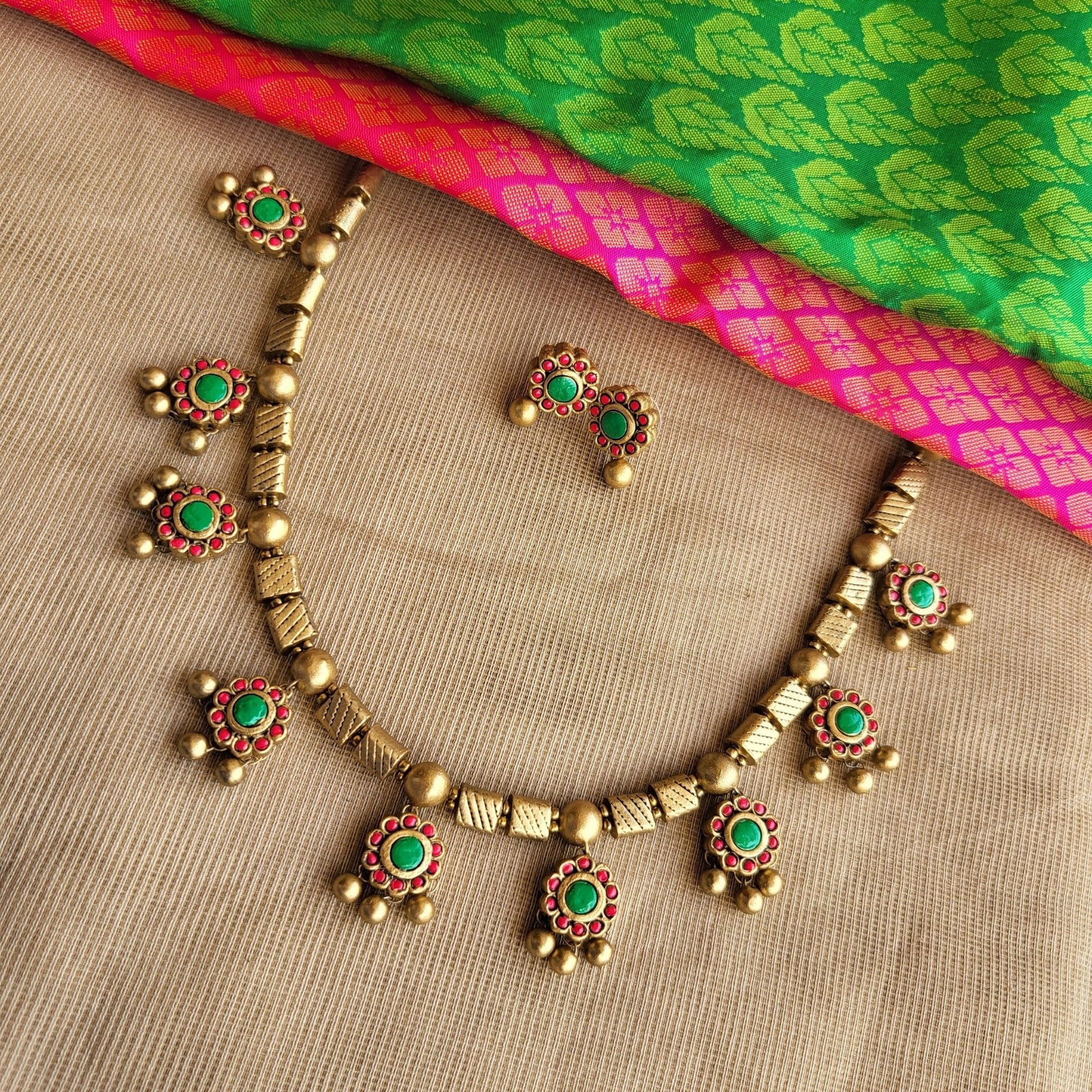 Antique gold tube detailing