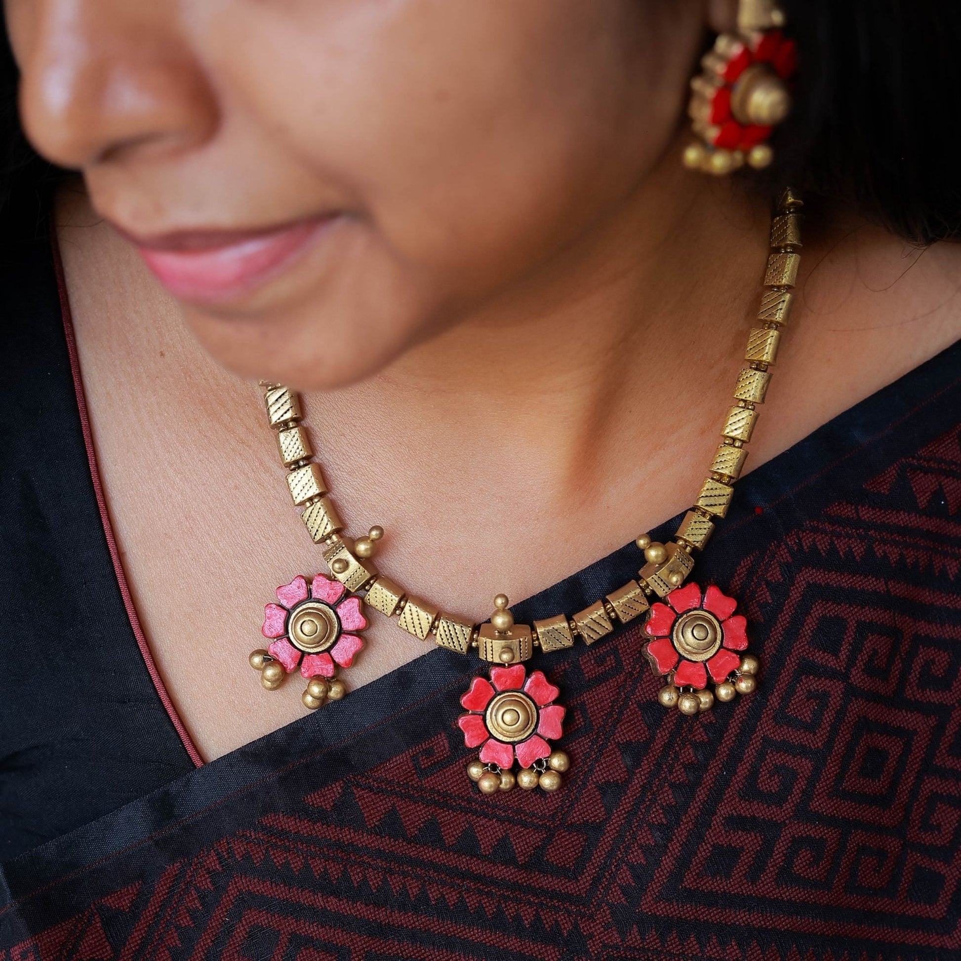 Lavanya handmade terracotta jewellery red floral motifs antique gold