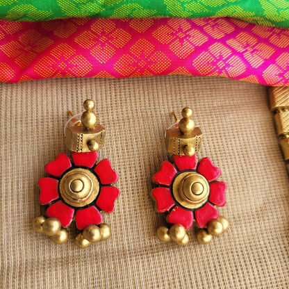 Red floral motif with tube detailing