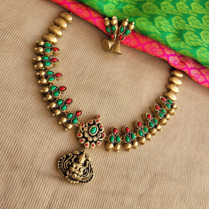 Handcrafted terracotta necklace with Lakshmi pendant and matching earrings