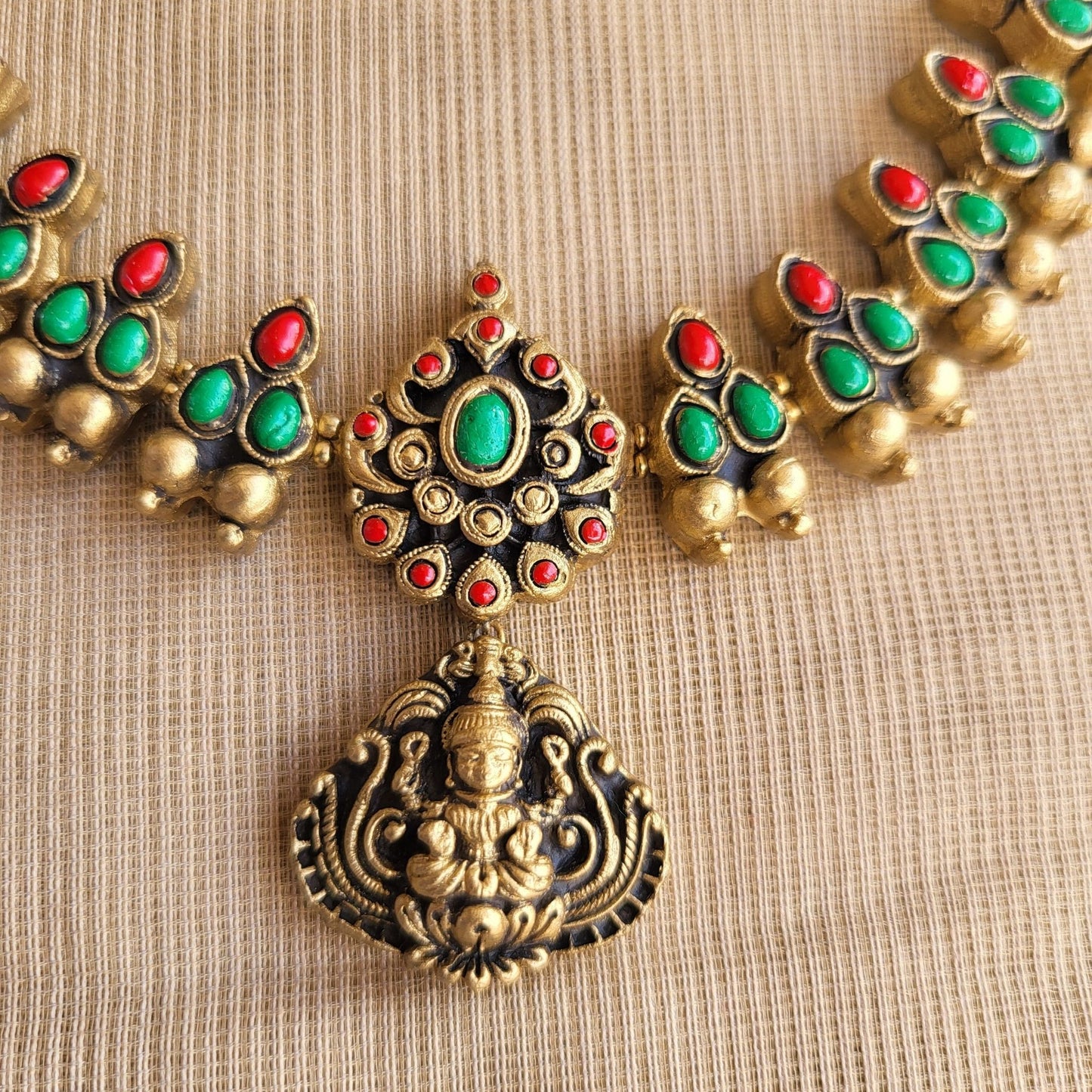 Antique gold Lakshmi pendant
