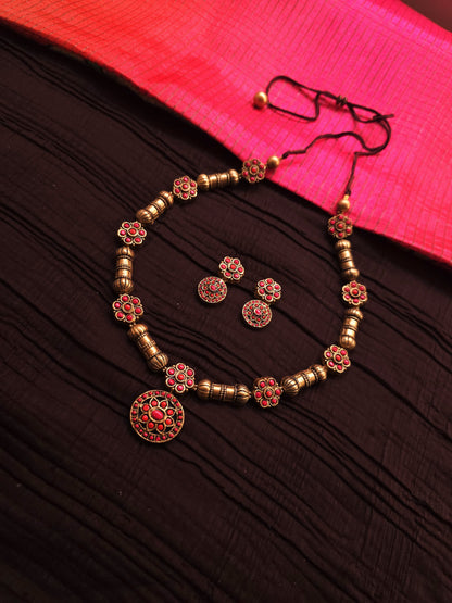 Malini Antique Gold Drum & Crimson Floral Medallion Terracotta Set