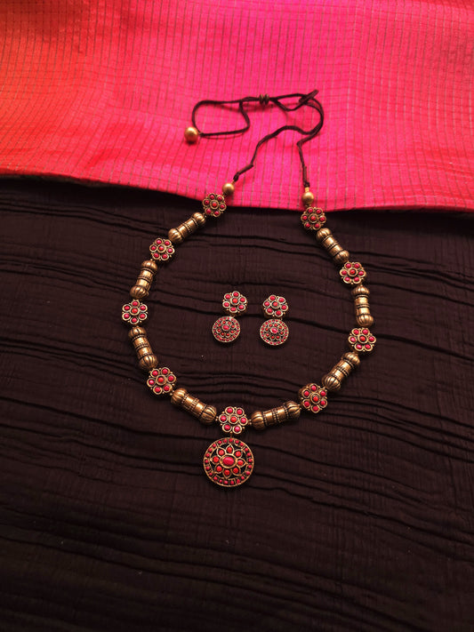 Malini Antique Gold Drum & Crimson Floral Medallion Terracotta Set