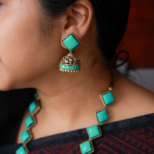 Manini - Aqua blue diamond haram with antique gold Lakshmi pendant terracotta jewellery with matching jumkas