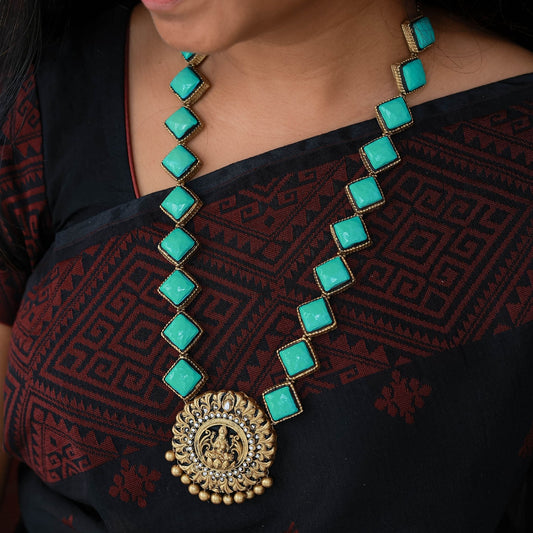 Manini - Aqua blue diamond haram with antique gold Lakshmi pendant terracotta jewellery with matching jumkas