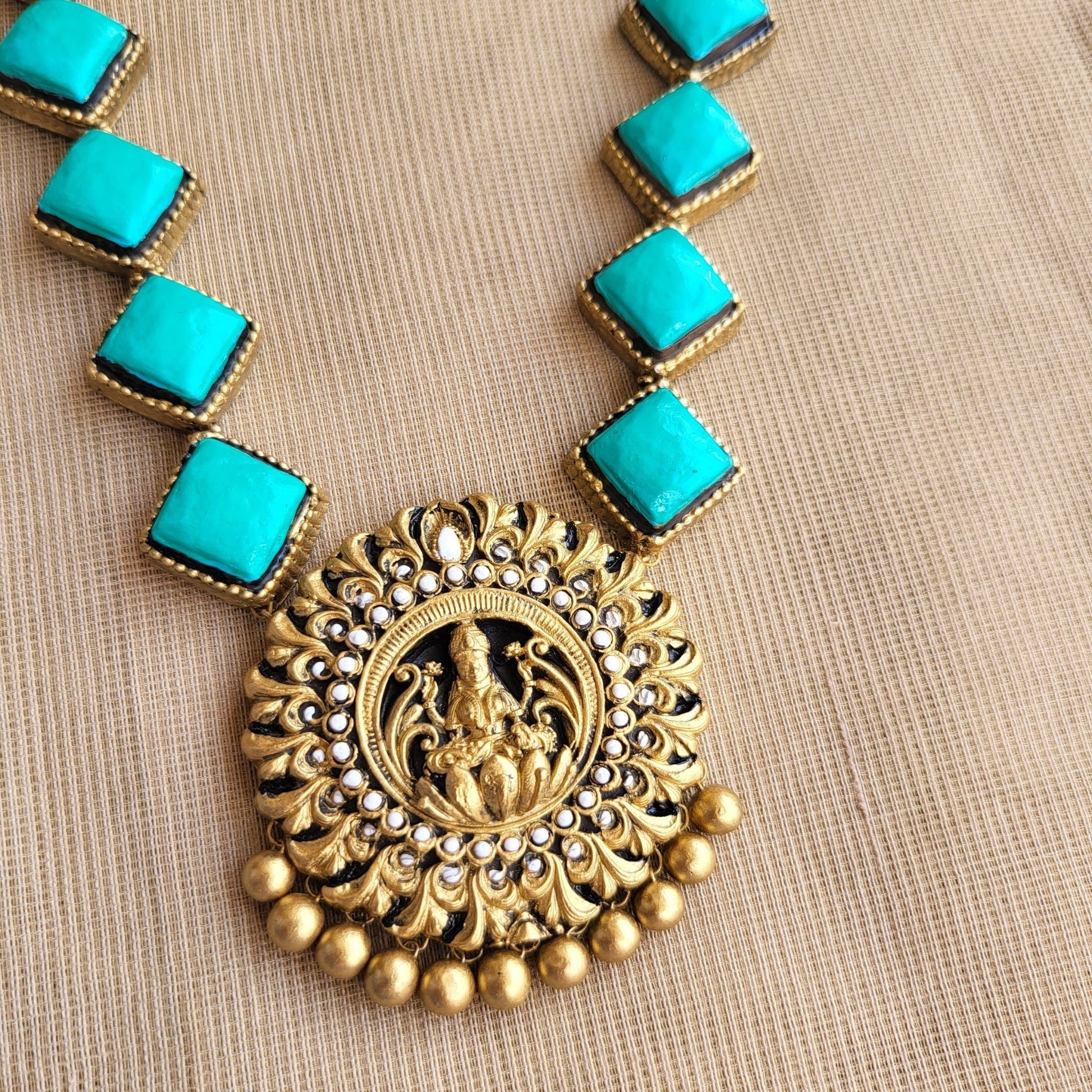 Contemporary ethnic terracotta jewellery set with aqua blue beads