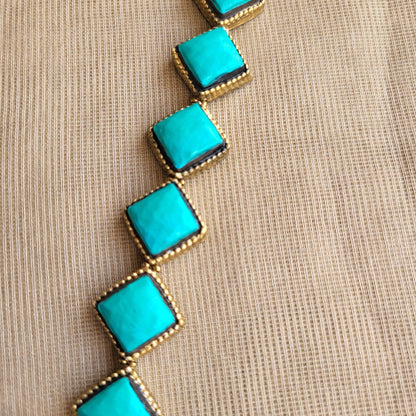 Aqua blue diamond-cut bead design