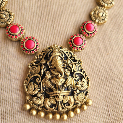 Peacock motif with red floral detailing
