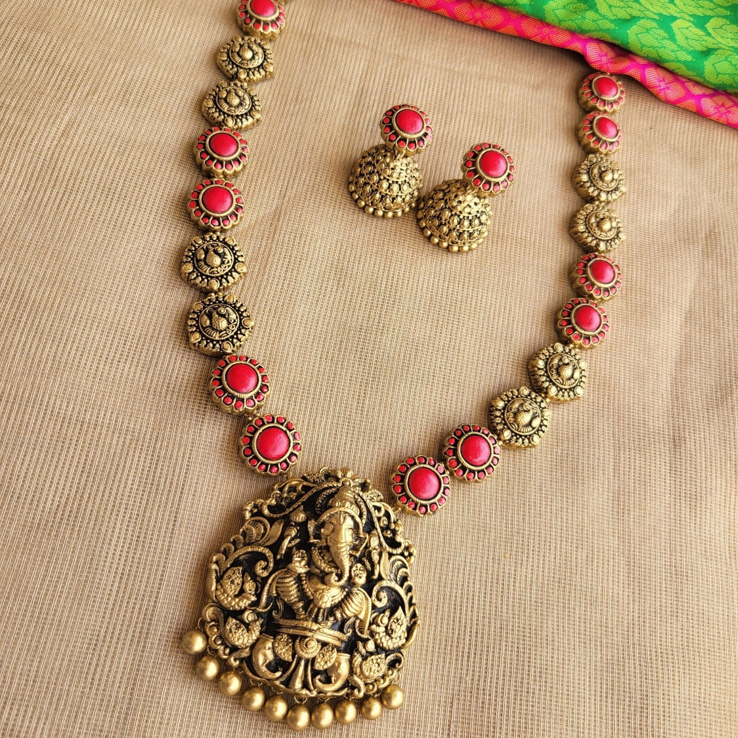 Matching terracotta jumka earrings handcrafted