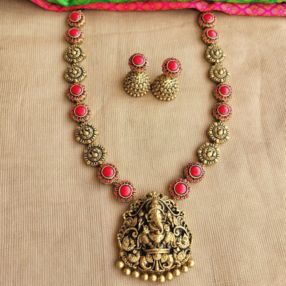 Handcrafted Ganesha pendant with red floral accents
