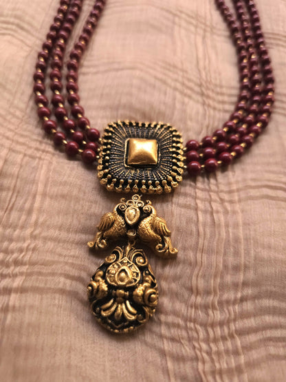 Mayura Antique Gold Peacock Emblem & Three-Layer Crimson Terracotta Set