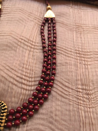 Mayura Antique Gold Peacock Emblem & Three-Layer Crimson Terracotta Set