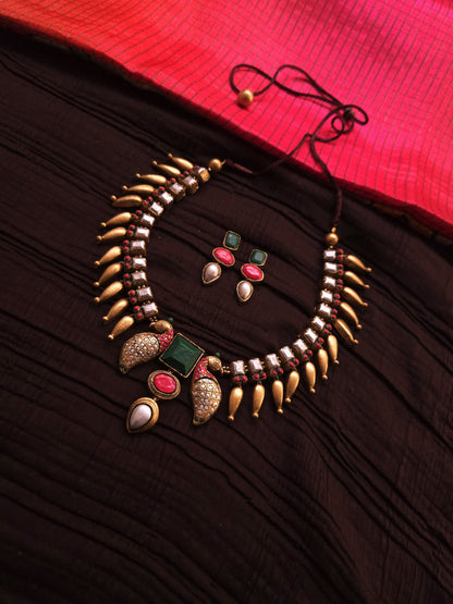 Mayura Kundan Antique Gold Peacock Fringe & Multi-Color Geometric Terracotta Set