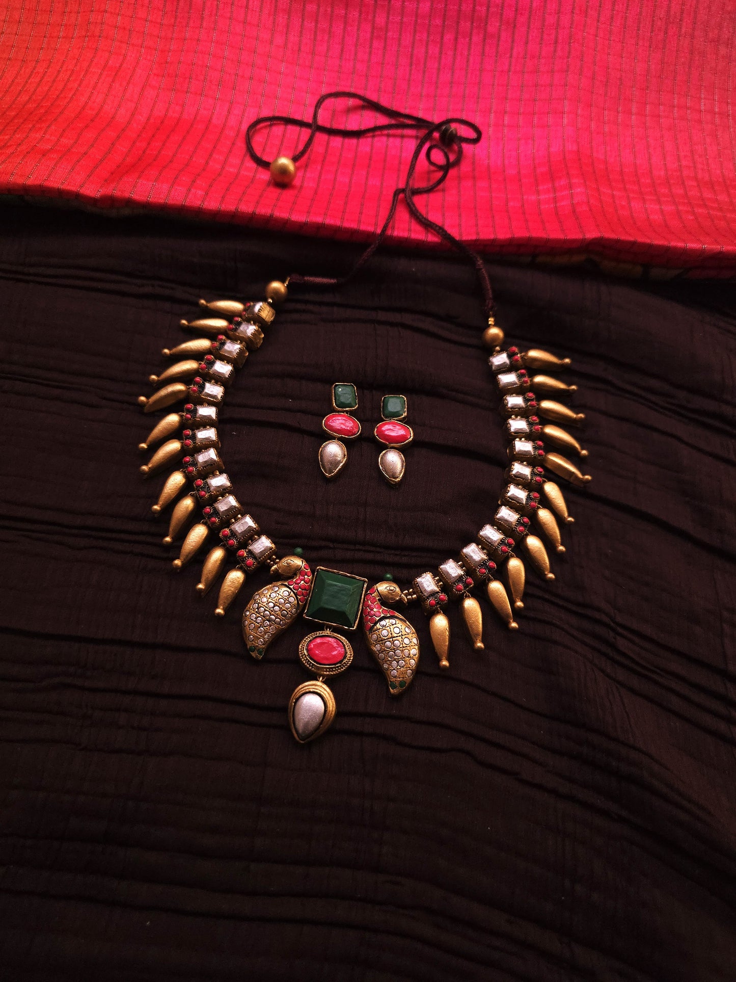 Mayura Kundan Antique Gold Peacock Fringe & Multi-Color Geometric Terracotta Set