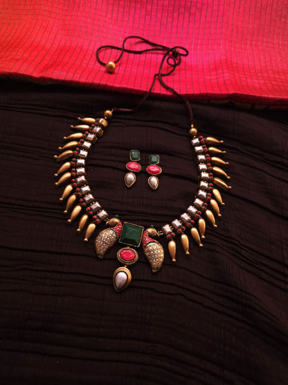 Mayura Kundan Antique Gold Peacock Fringe & Multi-Color Geometric Terracotta Set