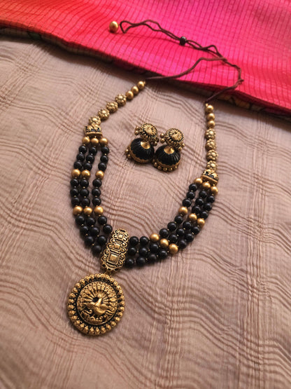 Mayura Antique Gold Peacock Medallion & Three-Layer Jet Black Terracotta Set