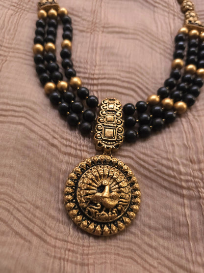 Mayura Antique Gold Peacock Medallion & Three-Layer Jet Black Terracotta Set
