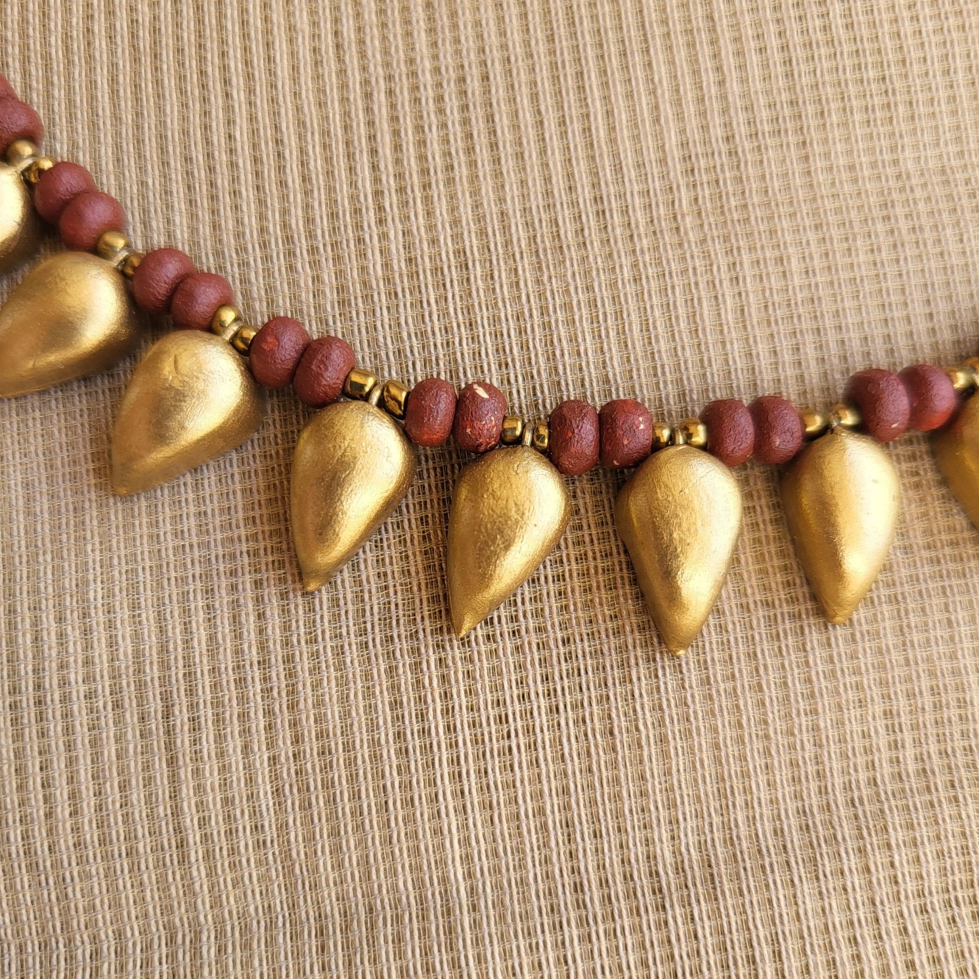 Contemporary terracotta golden drops for women