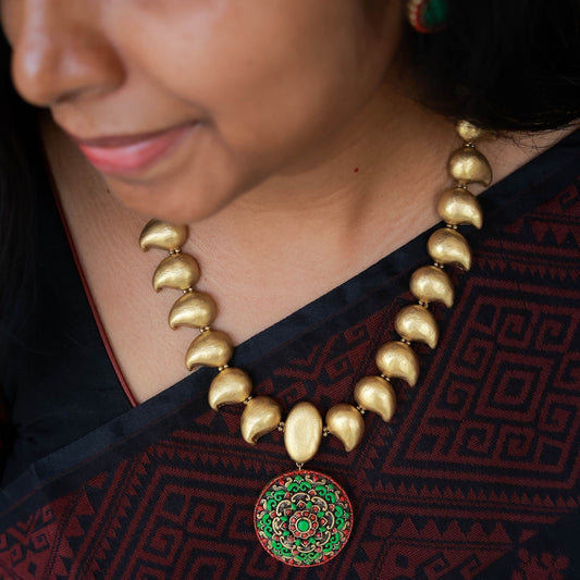 Mithraa - Antique gold mango motifs with mandala pink and green pendant terracotta jewellery with matching stud