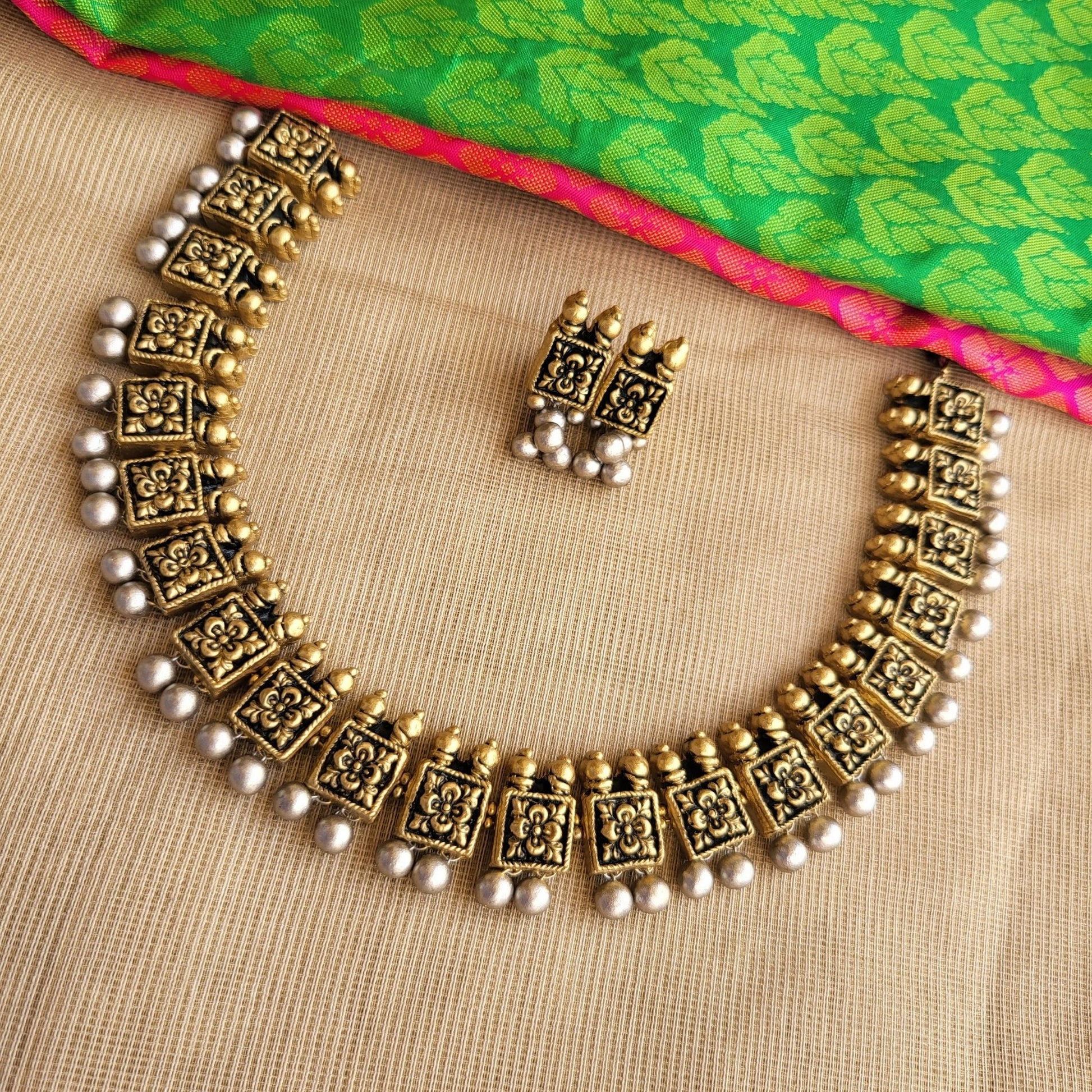 Handcrafted geometric terracotta choker with silver hangings