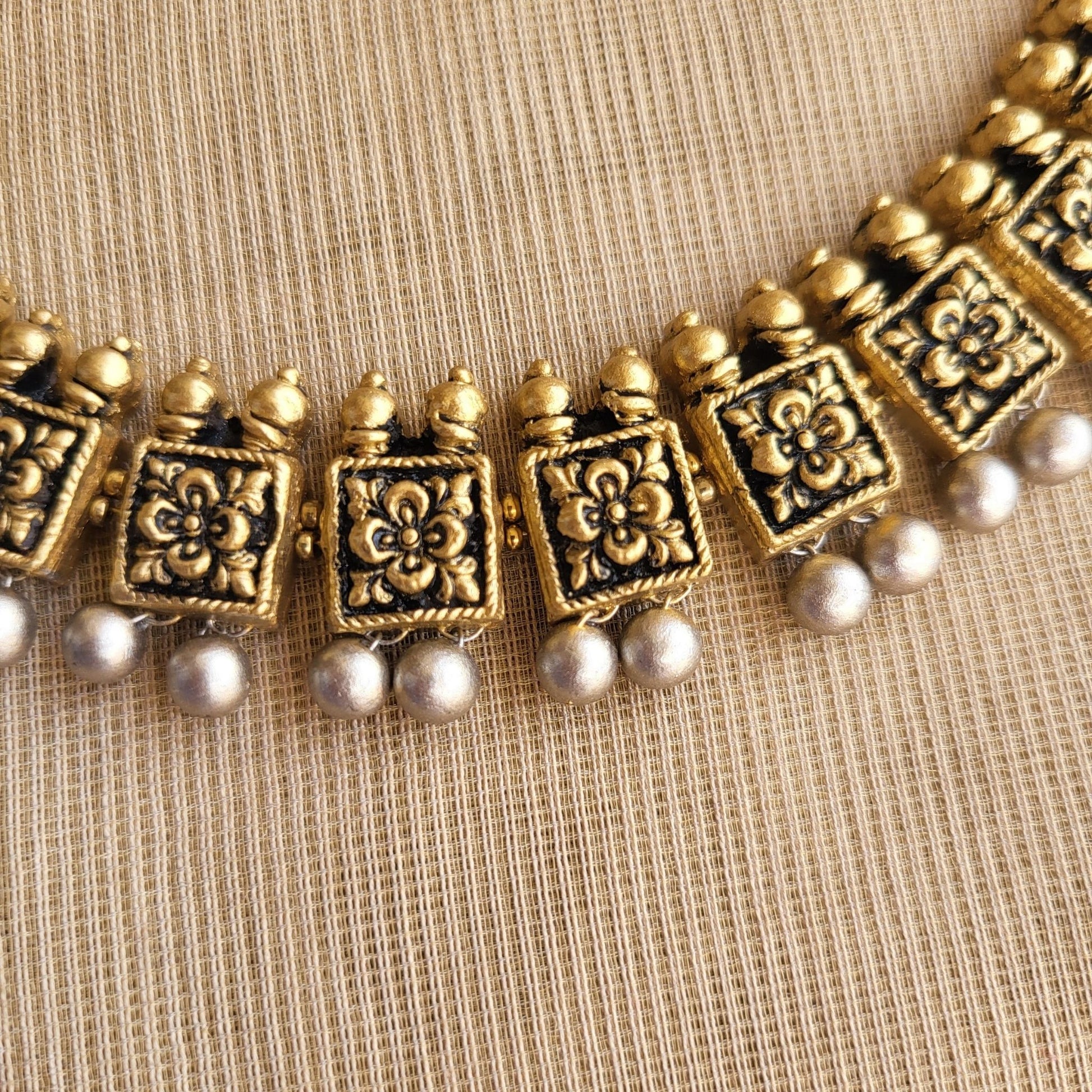 Handcrafted terracotta dual-tone choker with matching earrings